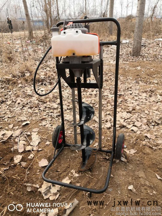富興機械生產(chǎn)耐用地鉆頭挖坑機 汽油打孔機 小型地面種樹鉆坑機廠家