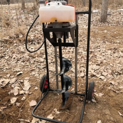 富興機械生產(chǎn)耐用地鉆頭挖坑機 汽油打孔機 小型地面種樹鉆坑機廠家